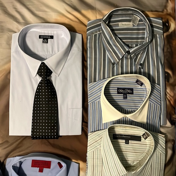 18 men’s button down dress shirts. Size L 32-33. Brand new!